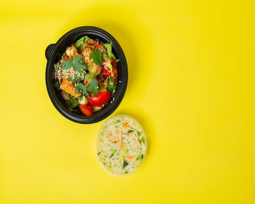 Colorful healthy salad bowl with diverse vegetables and seeds
